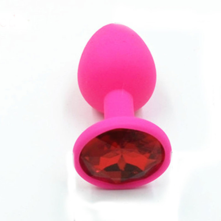 Rosebud en silicone rose avec strass rouge