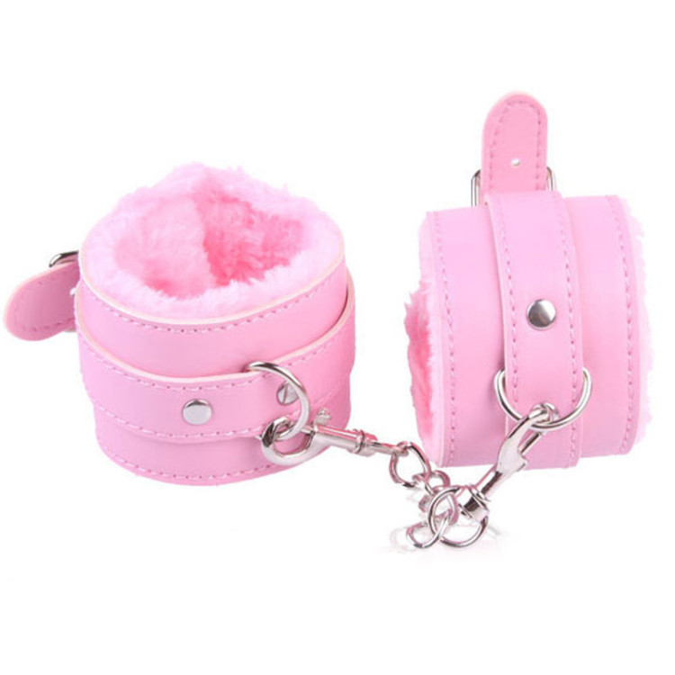 Menottes de poignets rose en cuir synthétique